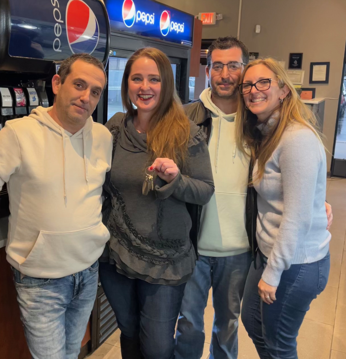 Picture of owners Ray, Ilisa, Damien, and Marisa 				(left to right)